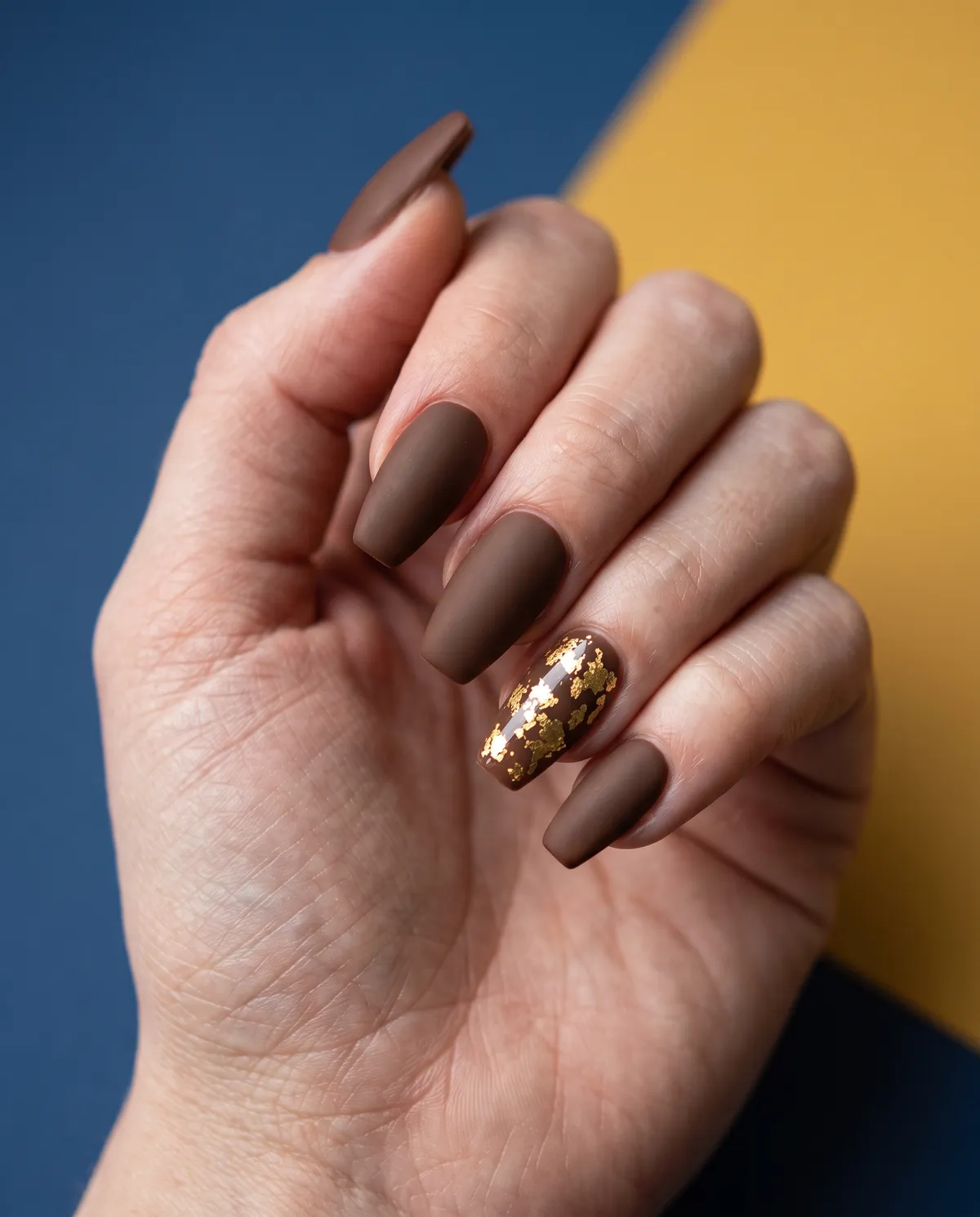 Gilded Oak Leaf — coffin thanksgiving nails with matte cocoa base on coffin nails, gold foil leaf accent on ring finger, glossy seal
