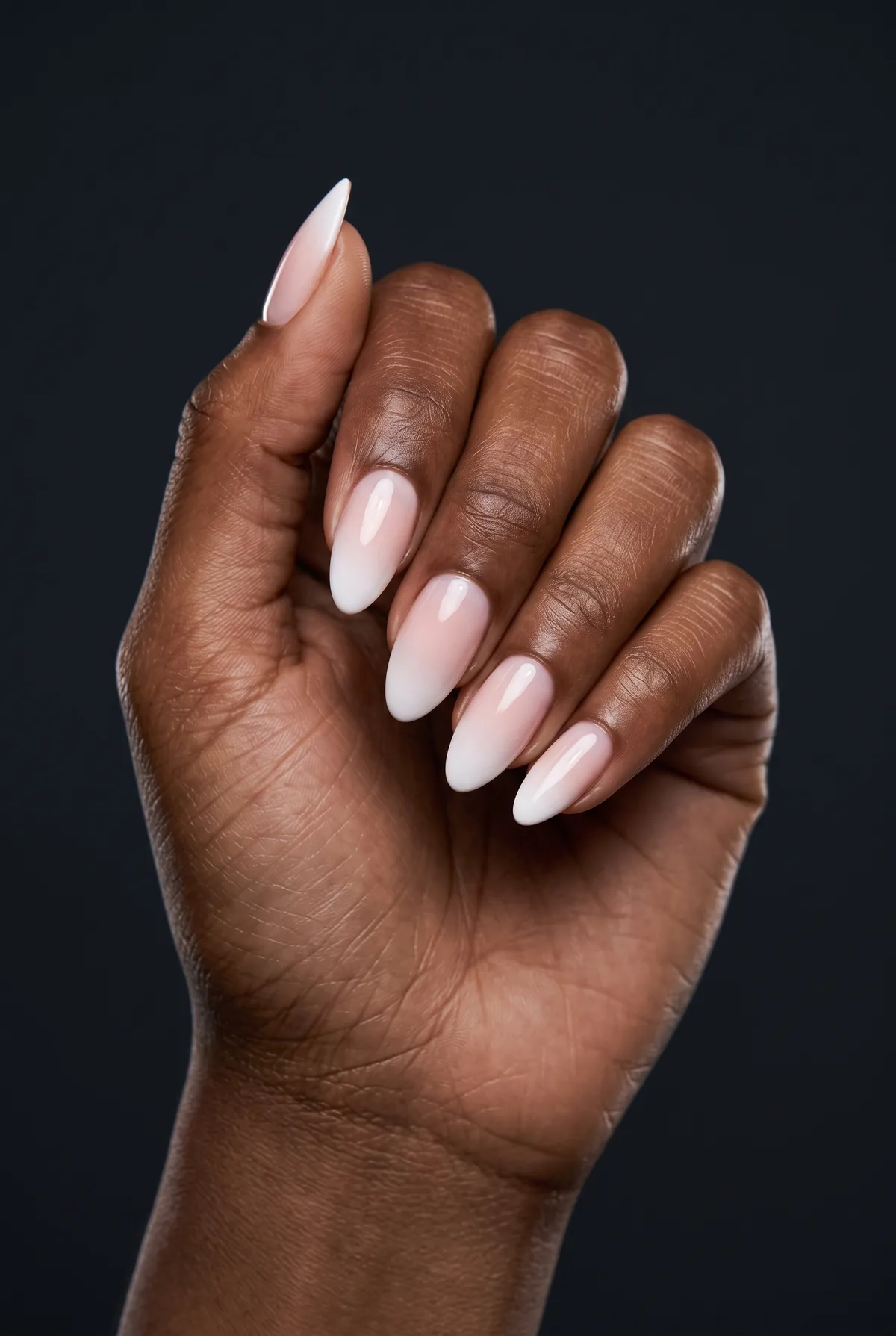 The Frombré — almond french nails with french ombré ("baby boomer"): white tip fading seamlessly into a blush-pink base, almond