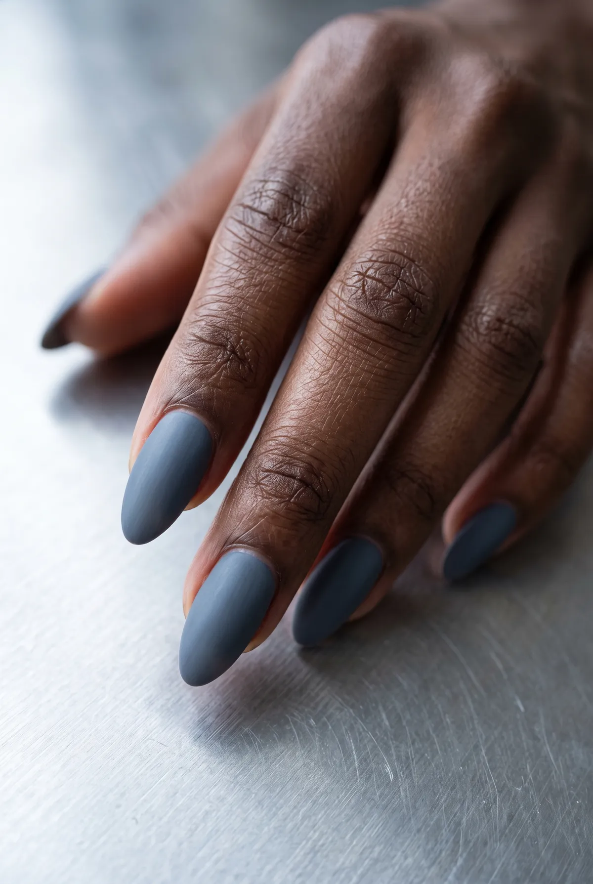Slate Frost — almond winter nails with almond shape, medium length, slate grey-blue polish, finish with matte topcoat, no shimmer or shine